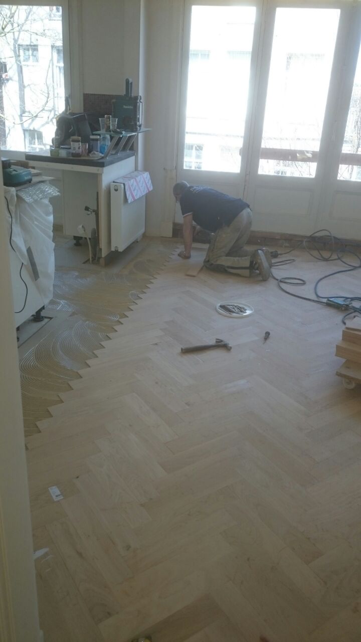 Visgraatvloer leggen